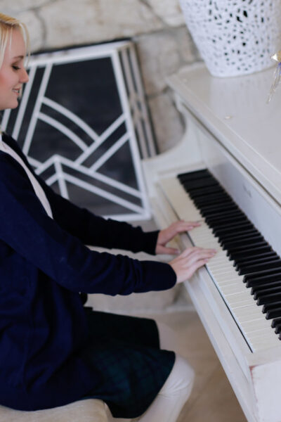 Delicious blonde Sammie Daniels strips to her socks and plays piano Image #3