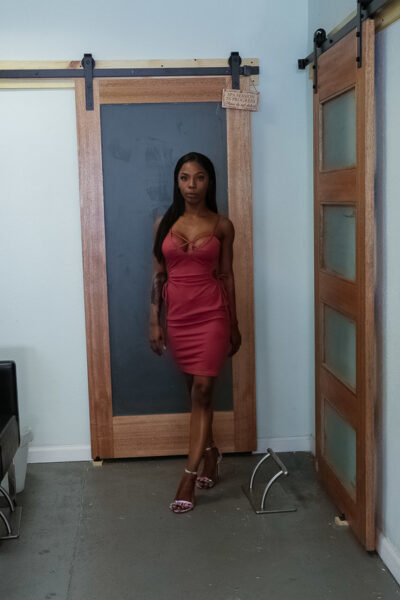 Smoking hot ebony doll Sarah Banks slips out off her pink dress for us Image #1