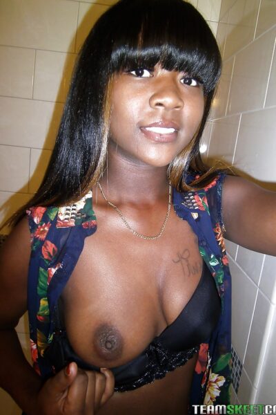 Playful ebony babe revealing her goods and making selfies Image #2