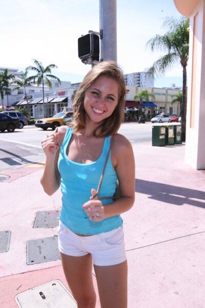 Adorable petite Riley Reid shows off her tiny tits & gets on her knees ass up Image #6