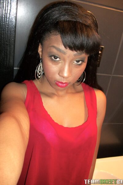 Afro-American hottie Mimi West flashes her delicious tits and ass in public Image #2