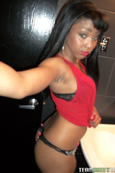 Afro-American hottie Mimi West flashes her delicious tits and ass in public Image #11