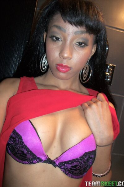 Afro-American hottie Mimi West flashes her delicious tits and ass in public Image #3