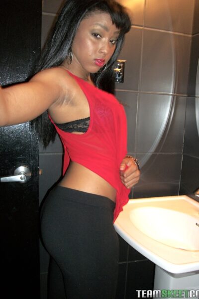 Afro-American hottie Mimi West flashes her delicious tits and ass in public Image #7