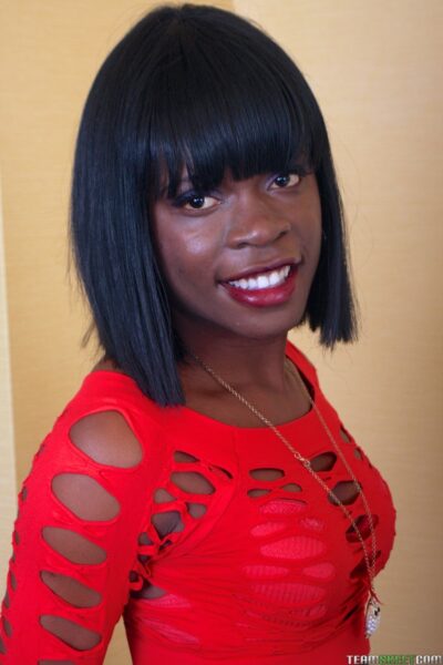 Skinny Jamaican ebony Sasha Fierce strips and masturbates with a sex toy Image #2