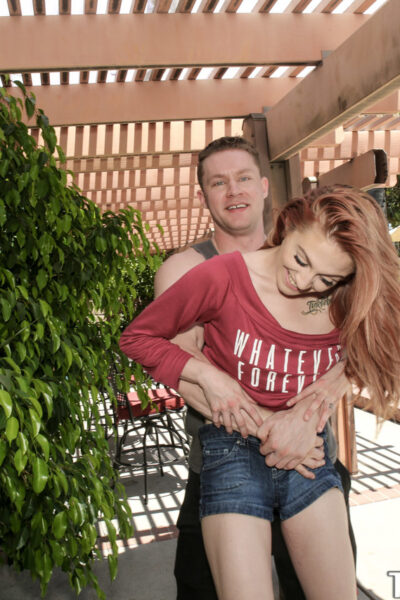 Small redhead Kandi Quinn gets fucked by her neighbour outdoors Image #2