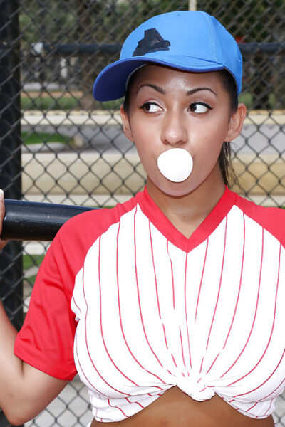 Busty Latina babe Priya Price shows off thong adorned ass in sports uniform Image #1