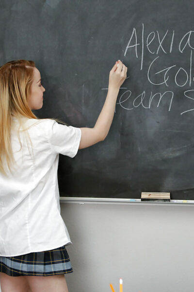 Teen schoolgirl Alexia Gold demonstrates her big tits while undressing Image #2