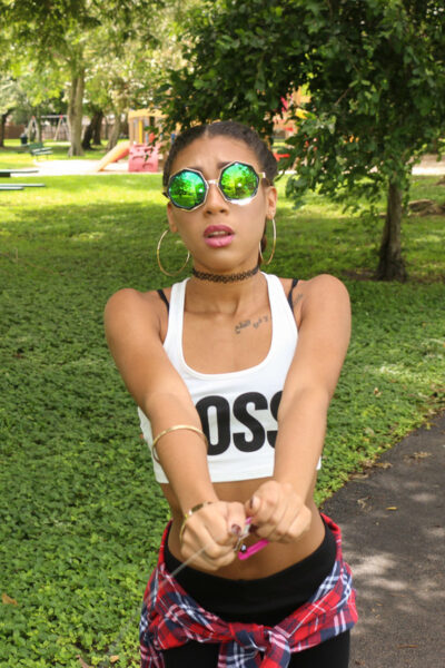 Beautiful skinny ebony babe Kendall Woods plays and flies a kite outside Image #11