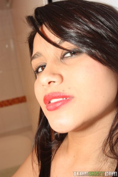 Black haired teen Jennifer Rico models appealing natural tits & flashes pussy Image #20