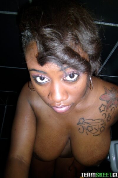 Busty ebony teen Serenity Red oils up her big tits & fucks a white dick Image #2