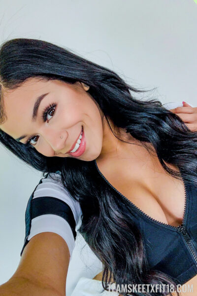 Raven-haired teen Savannah Sixx strips her sportwear & shows her big boobs Image #14