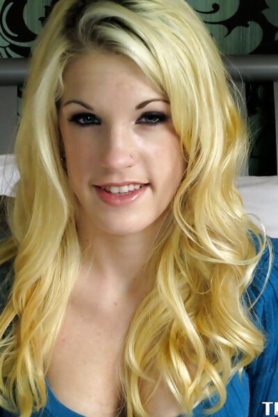 Slippy teenage amateur Rebecca Young stripping on the bed Image #2