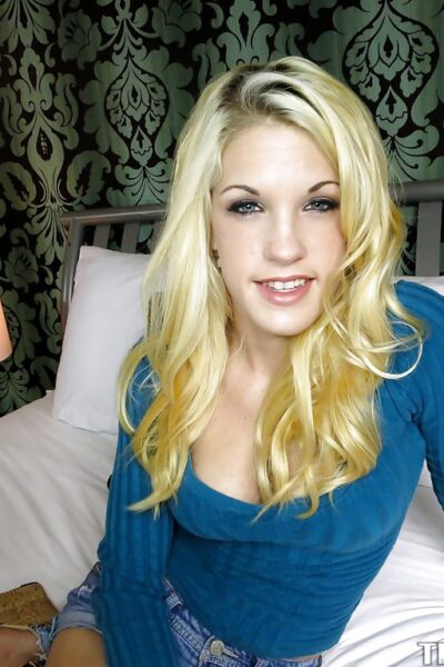 Slippy teenage amateur Rebecca Young stripping on the bed Image #3