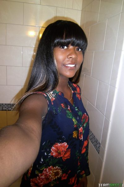 18 year old ebony teen Kaci Starks poses nude in front of her camera Image #1