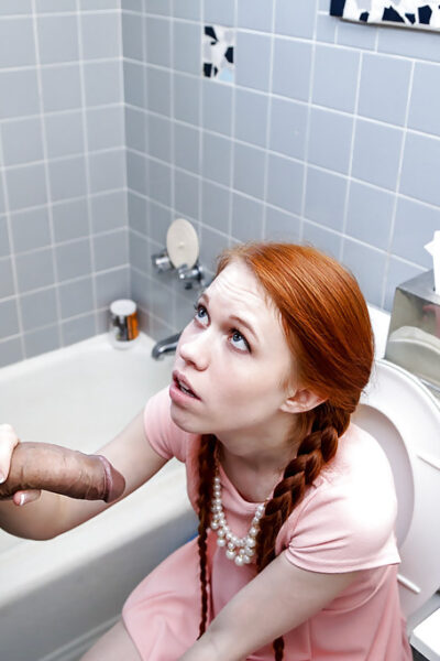 Natural redhead teen Dolly Little giving large dick CFNM oral sex in pigtails Image #3