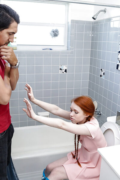Natural redhead teen Dolly Little giving large dick CFNM oral sex in pigtails Image #1
