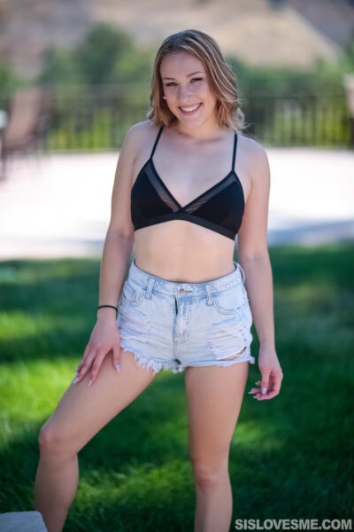 Naughty blonde Kasey Miller kneels down and exposes her perfect booty Image #2