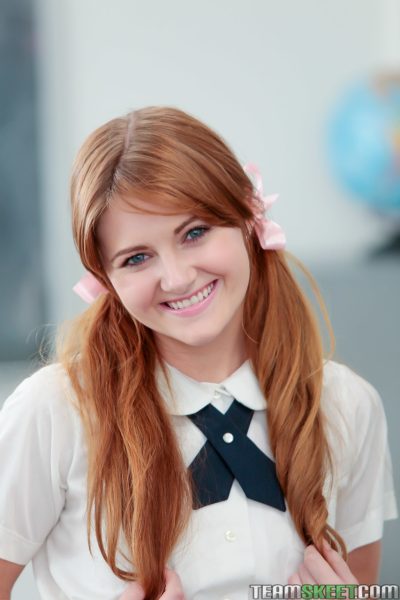 Pigtailed redhead student Miley Cole undresses to play nude on teacher's desk Image #3