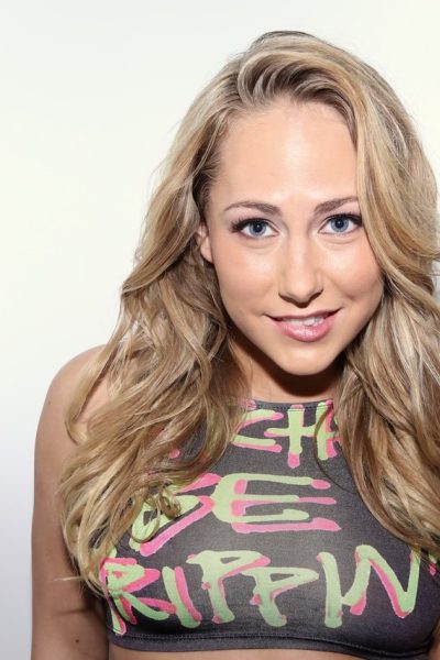 Good looking skinny teen Carter Cruise strips her short shorts to bare hot ass Image #1