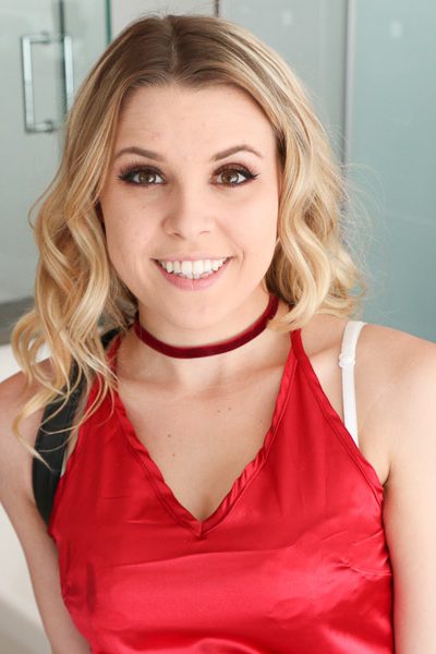 Sweet blond teen Aubrey Sinclair strips down to white lingerie and black boots Image #1